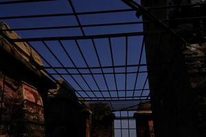 Bars on the viewing roof of the church in Bologna photo