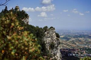 Spectacular view of the fortress in San Marino on a summer day photo