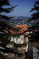 the streets of San Marino are surrounded by greenery photo