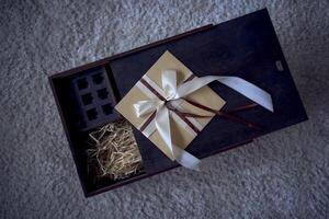 gift certificate on a wooden whiskey box photo