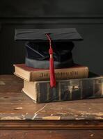 AI generated A graduation cap and books with golden tassels on the topand books. Generated by artificial intelligence. photo