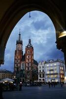 View of Krakow Square through an archway photo