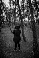 Young woman in the forest photo