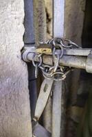 Padlock on a fence photo