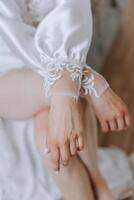 tender hands of a young woman with an expensive ring and a beautiful manicure. Close-up photo of female hands