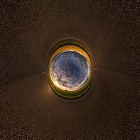 blue hole sphere little planet inside sand round frame background photo