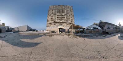 full 360 hdri panorama near tallest hindu shiva statue and castle tower gopuram in india on mountain near ocean in equirectangular spherical seamless projection photo