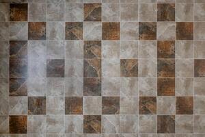 stone and ceramic floor tiles texture in corridor, view from above photo