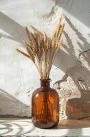 AI generated brown bottle holding wheat stalks against white wall photo