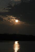 The afterglow of the sunset over the lake photo