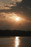 The afterglow of the sunset over the lake photo