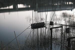 The foundation of an unfinished building filled with water photo