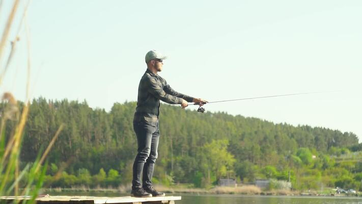 a fishing rods on the lake shore. 17534932 Stock Photo at Vecteezy