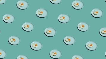 Pattern with many fried eggs on plates animated on vintage background. Plates move in different directions. 4K video