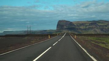 Car driving on the road to Iceland. Inside view of a car. Road number 1 is Iceland's main road. 4K video