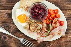 Full English breakfast on a plate. photo