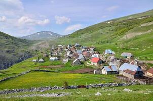 Mountain village Lukomir in Bosnia and Herzegovina. Unique and traditional village. Unique village in Europe. Medieval traditional way of living. Rural tourism and holidays. photo