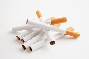 Cigarette, roll tobacco in paper with filter tube, No smoking concept. photo