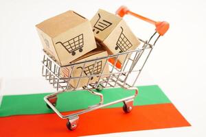 Online shopping, Shopping cart box on Bangladesh flag, import export, finance commerce. photo