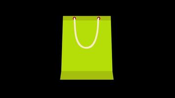 A blue shopping bag with white handles icon concept loop animation video with alpha channel