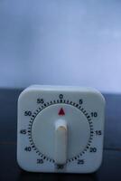 Traditional square manual timer as a timer in the laboratory photo
