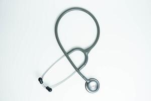 Stethoscope isolated on white background, top view. Medical tool. Health care concept photo