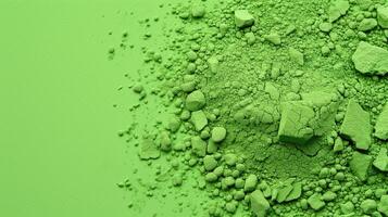 AI generated Green matcha powder scattered on a green background. View from above. Copy space. Horizontal format. photo