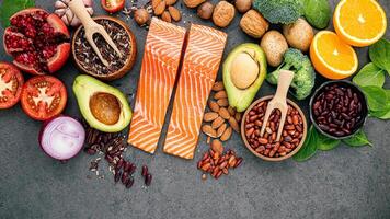 Healthy ingredients on a wooden background Free Photo, Raw salmon and healthy ingredients photo