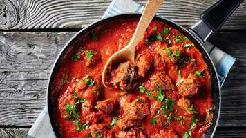 Ghanaian food, japanese curry, beef karahi, close-up of spicy Beef Stew in tomato sauce, ghana food photo