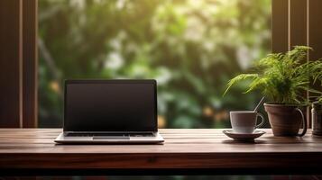 ai generado computadora ordenador portátil en trabajando escritorio con un taza de café un planta sitio cerca ventana con natural ver foto