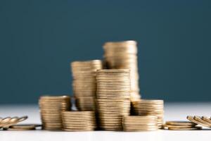 Coin stack growing and find out the way to get a return on investment. Finance and money exchange investment as concept. photo