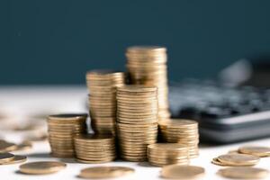 Coin stack growing and find out the way to get a return on investment. Finance and money exchange investment as concept. photo