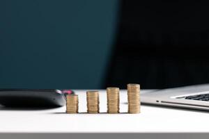 Coin stack growing and find out the way to get a return on investment. Finance and money exchange investment as concept. photo