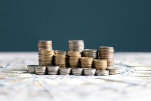 Coin stack growing and find out the way to get a return on investment. Finance and money exchange investment as concept. photo