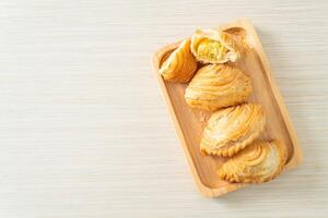 curry puff stuffed beans on plate photo