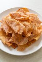 Taro Chips - fried or baked sliced taro photo