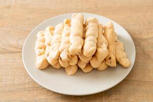 almonds meringue stick on plate photo