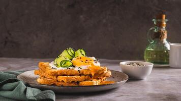 Toasts with cream cheese, cucumber, poached egg and sesame seeds on a plate web banner photo
