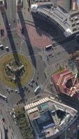 Vertical video of Traffic Movement in Barcelona. Plaza del Espana. Spain, Top View