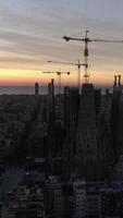 Vertical Video of Sagrada Familia Cathedral, in Barcelona at Sunrise Aerial View