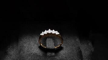 Diamond ring in black jewel box isolated over white. High quality photo
