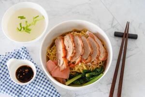 Roasted duck with noodle, traditional Chinese food photo