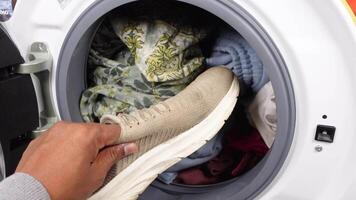 close up of cloths in a washing machine. video