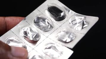 Close up of empty pills of blister pack on table video