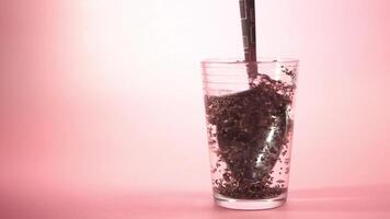 close up of chia seeds in a glass of water video