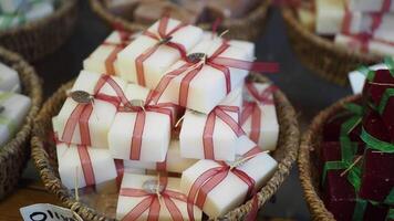 Baskets filled with soap bars tied with ribbons video