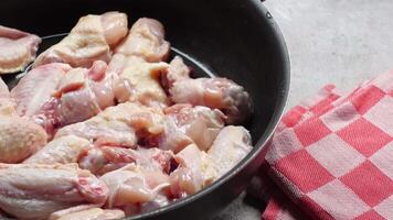 raw breast chicken meat in a cooking pan video