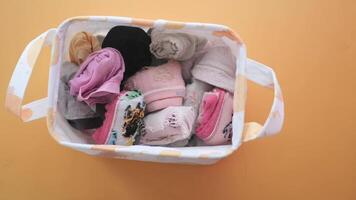 box with organized folded socks . video