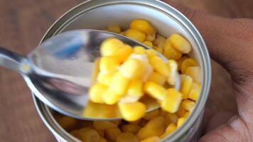 canned sweet corn close up . video