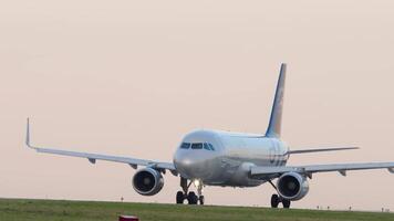 KAZAN, RUSSIA - AUGUST 05, 2022. Airbus A320, RA-73757 of Aeroflot, Skyteam livery taxiing at Kazan airport. Jet airplane on the airfield on a summer day. Tourism and travel concept video